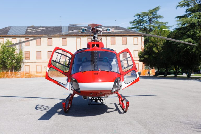 A Elifriulia rescue helicopter parked on the runway